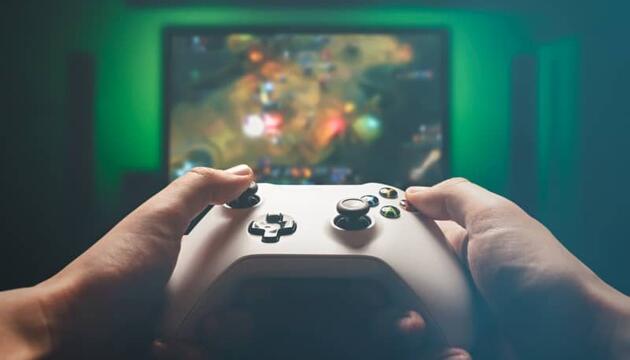 Adicción a los videojuegos representado por un mando